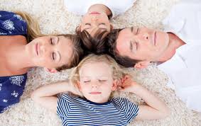 Family on carpet
